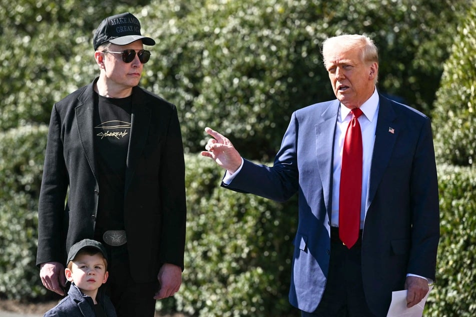 President Donald Trump (r.) and Elon Musk (l.), alongside Musk's son X Æ A-Xii, outside the White House in Washington DC on March 11, 2025.