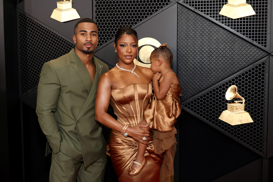 John Gaines, Victoria Monet, and Hazel Monet attend the 66th Grammy Awards on February 4, 2024, in Los Angeles, California.