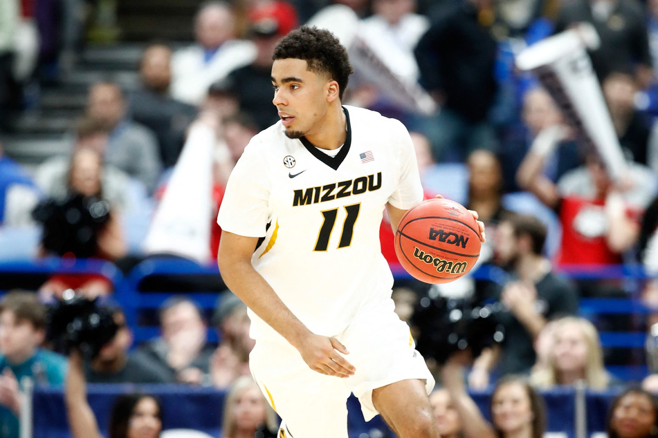 Jontay Porter #11 of the Missouri Tigers dribbles the ball against the Georgia Bulldogs during the second round of the 2018 SEC Basketball Tournament at Scottrade Center on March 8, 2018 in St Louis, Missouri.