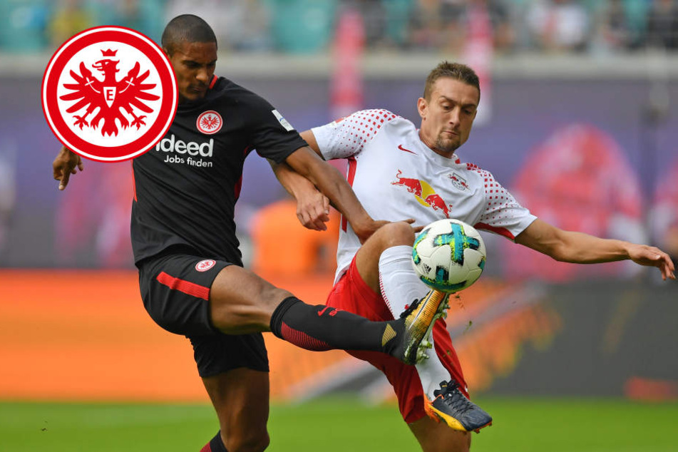 Frankfurts Sébastien Haller und Leipzigs Stefan Ilsanker (r) und kämpfen um den Ball.