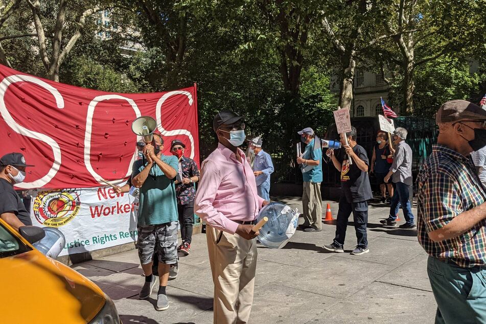 The NYC Taxi Alliance has held demonstrations outside City Hall and demanded Mayor Bill de Blasio help them pay off their debt for buying overpriced taxi medallions from the city. They fear losing their homes or having their wages garnished when the foreclosures start.