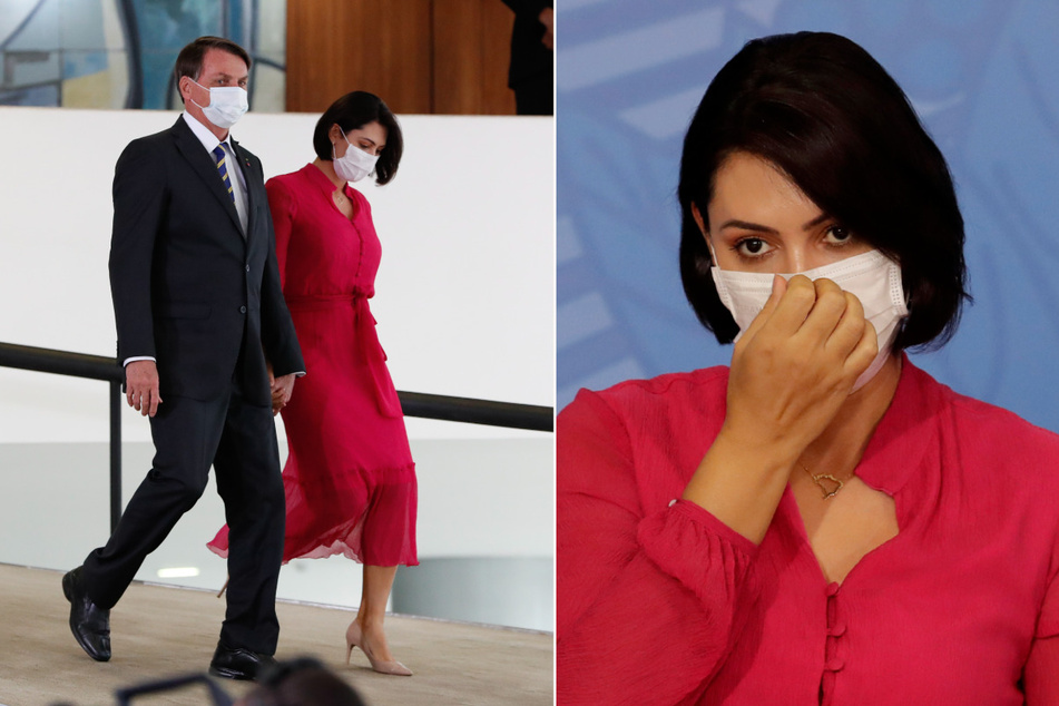 Auf diesem vom brasilianischen Präsidentenamt zur Verfügung gestellten Bild kommen Jair Bolsonaro, Präsident von Brasilien, und seine Frau Michelle mit Mundschutz zu einer Veranstaltung im Regierungspalast.