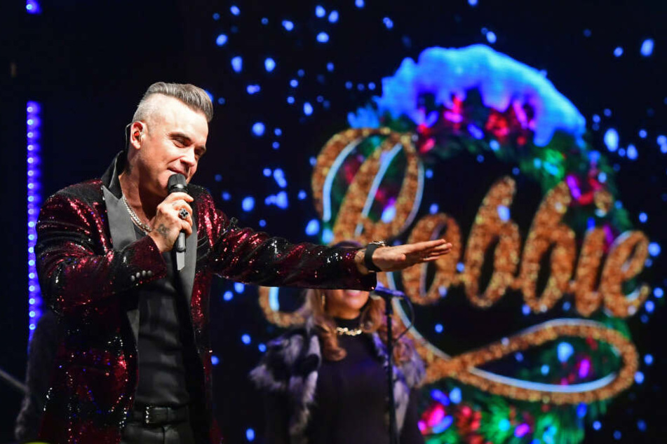 Robbie Williams (45).