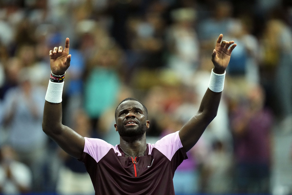 Frances Tiafoe reacts after defeating Rafael Nadal at the 2022 US Open.