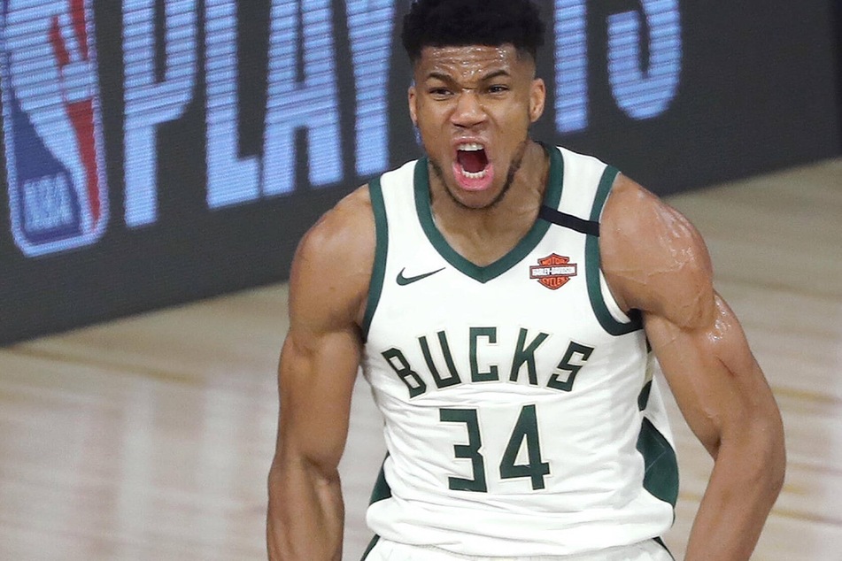 Bucks forward Giannis Antetokounmpo scored 50 points on his way to winning his first championship and Finals MVP honors.