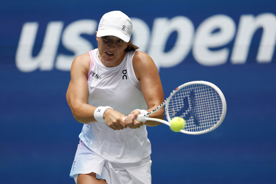 Iga Swiatek of Poland in action during her second round match against Japan's Ena Shibahara (not pictured).