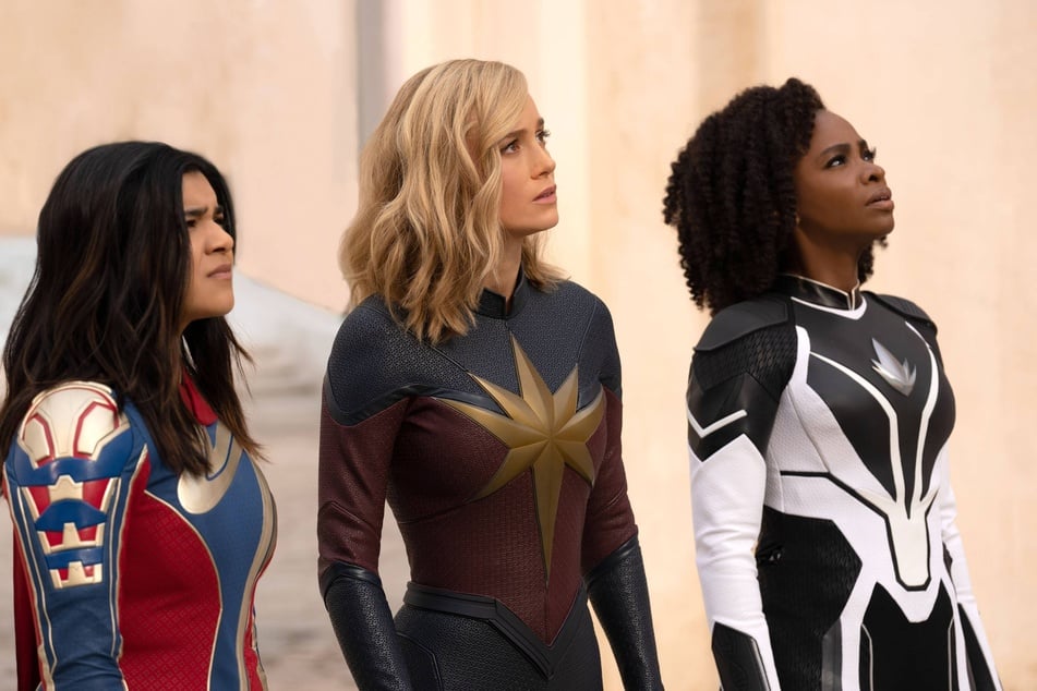 From left to right: Iman Vellani as Ms. Marvel, Brie Larson as Captain Marvel, and Teyonah Parris as Captain Monica Rambeau in Disney's The Marvels.