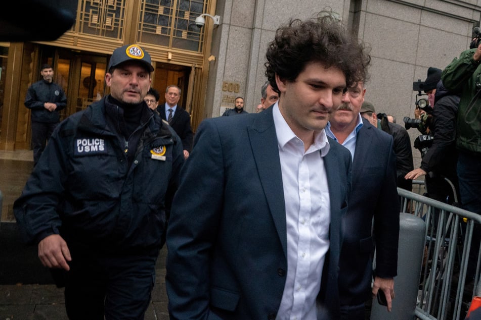 Former FTX Chief Executive Sam Bankman-Fried, who faces fraud charges over the collapse of the bankrupt cryptocurrency exchange, departs from his court hearing in Manhattan on January 3, 2023.