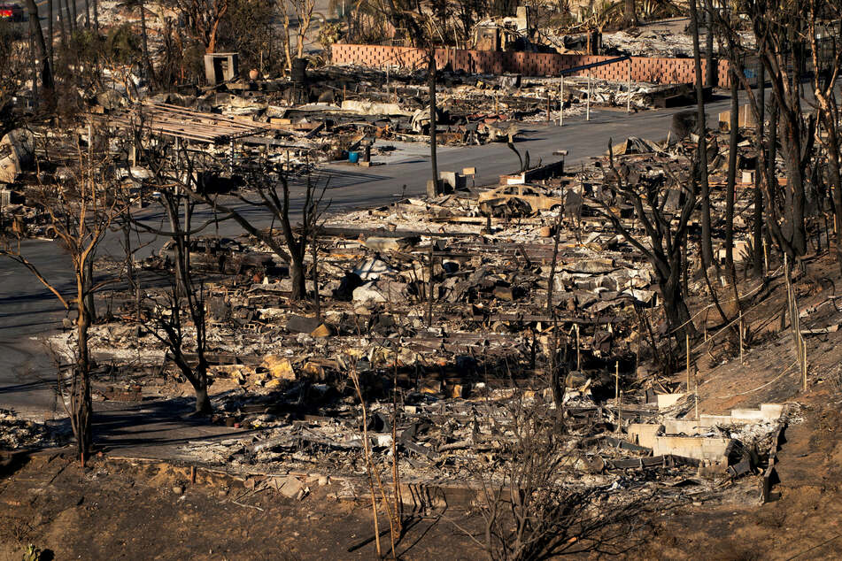 The remains of homes burned by the Palisades Fire are pictured in the Pacific Palisades neighborhood in Los Angeles, California.