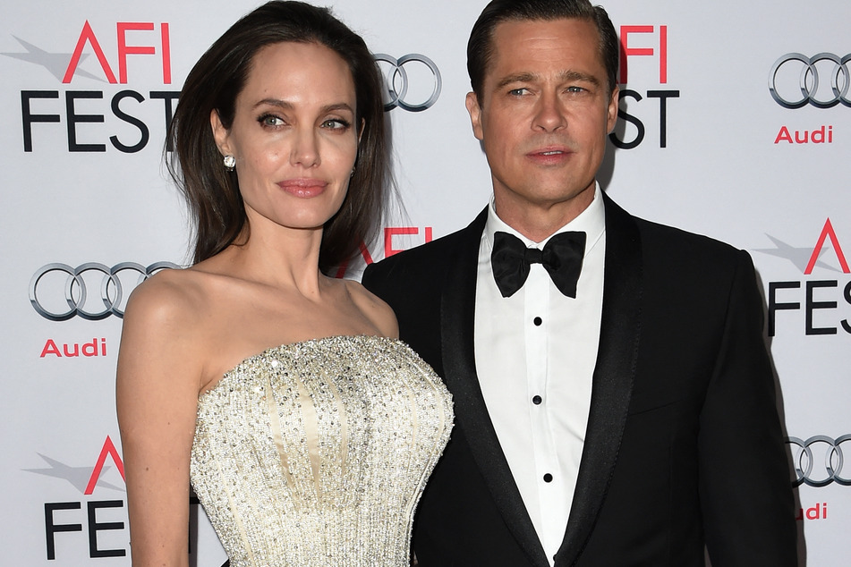 Angelina Jolie (l) filed for divorce from Brad Pitt in September 2016, shortly after the family's private jet flight from France to LA.