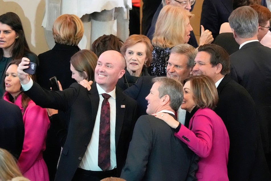 Utah Gov. Spencer Cox taking a selfie with (from L to R) Tennessee Gov. Bill Lee, Florida Gov. Ron DeSantis, Iowa Gov. Kim Reynolds, and Georgia Gov. Brian Kemp during the Inauguration of Donald Trump in Washington DC on January 20, 2025.