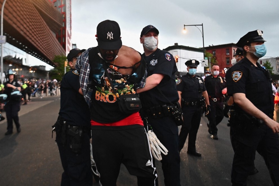 A protester gets arrested by NYPD during a Black Lives Matter protest near New York City's Barclays Center on May 29, 2020, following the police killing of George Floyd.