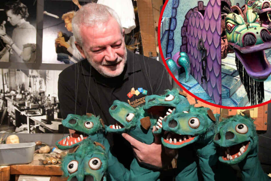 Klaus Marschall, der Leiter der Augsburger Puppenkiste, bei der Vorbereitung eines mehrköpfigen Marionettenungeheuers.