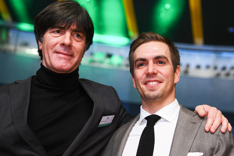 Philipp Lahms (r.) Kritik an Jogi Löw (l.) schlägt hohe Wellen.