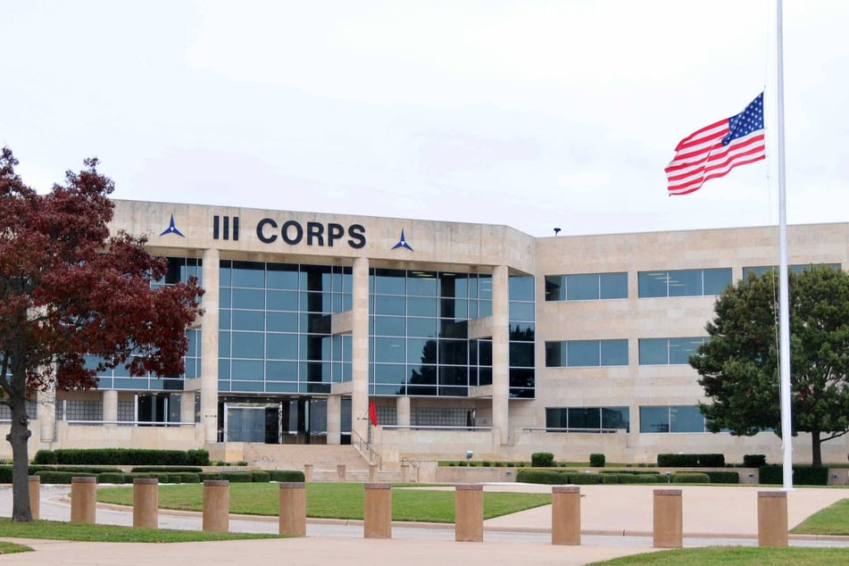 A US flag flaunts at half staff at the III Corps of the Fort Hood, Texas, on November 7, 2009, honoring those killed during the shooting rampage at Fort Hood.