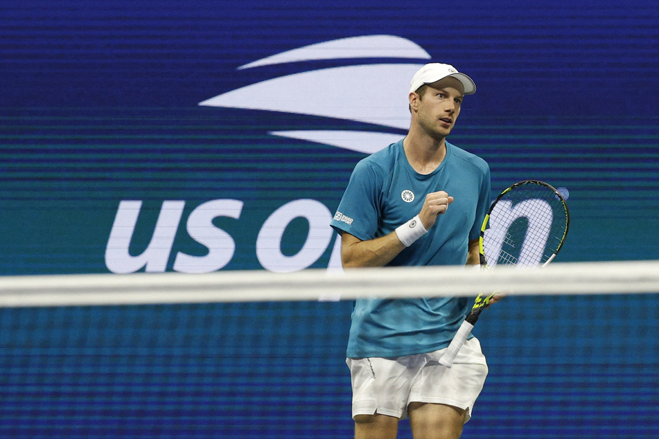 Botic van De Zandschlup of the Netherlands reacts after winning a point against Carlos Alcaraz of Spain (not pictured).