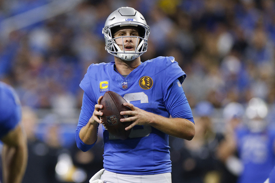 Jared Goff #16 of the Detroit Lions trying to pass against the Green Bay Packers during the fourth quarter of the game on Thursday in Detroit, Michigan.