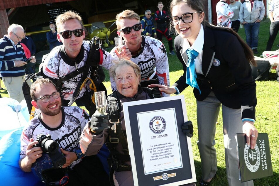Rut Larsson celebrates after receiving her Guinness world record certificate.
