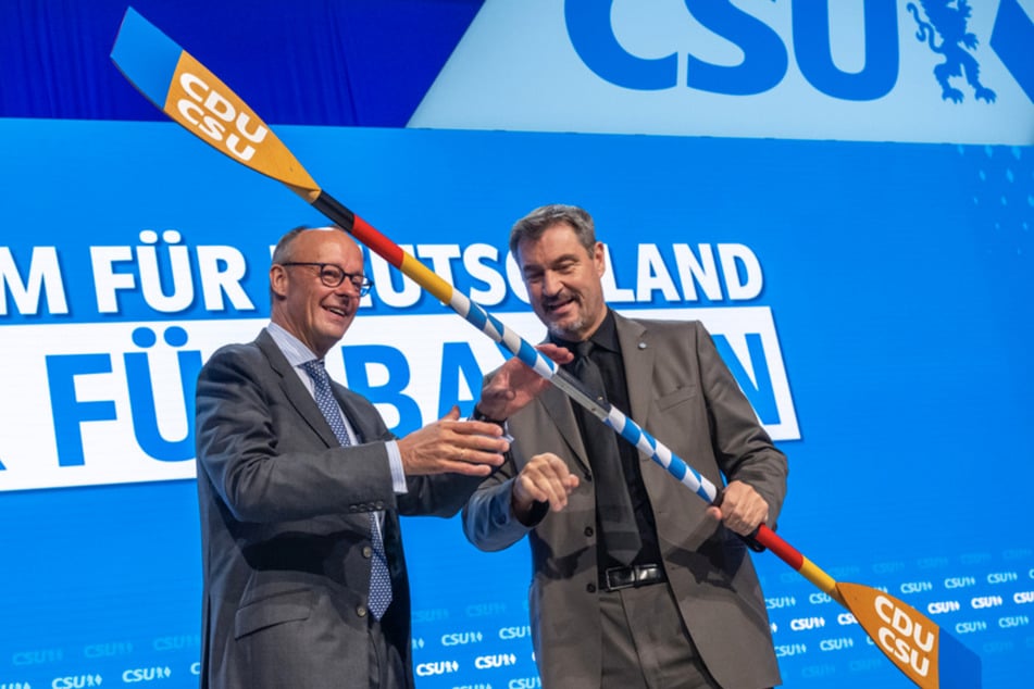 Trouble ohne Paddel: Die Union will mit Merz und Söder (57, CSU, r.) gemeinsam durch den Wahlkampf rudern.