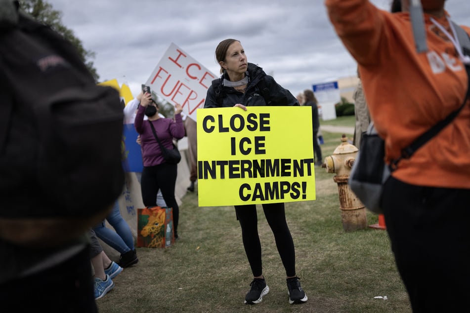 Demonstrators protest outside of the ICE immigration processing and detention facility in Broadview, Illinois, on October 11, 2025.