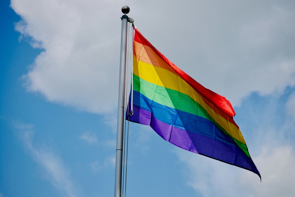 A California lifeguard who took down LGBTQ+ Pride flags because he did not want to work "in these conditions" is suing his employers claiming religious discrimination.