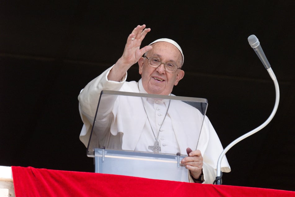 Pope Francis leads the Angelus prayer from his window at the Vatican on August 4, 2024.