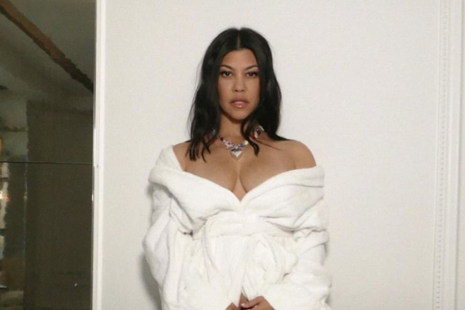 Kourtney Kardashian was hit with pregnancy from fans under her latest Instagram post.