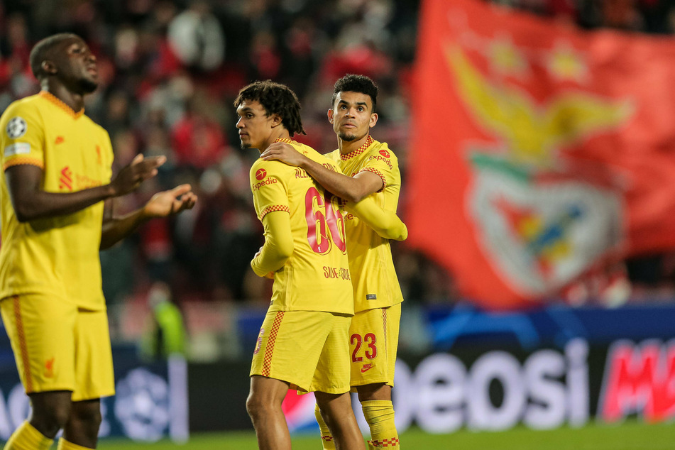 Liverpool players at the final whistle of their quarter-final first leg against Benfica.