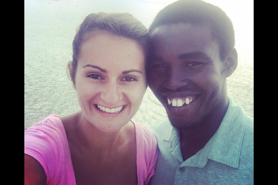 Alix Dorsainvil and her husband, the director of the Christian aid group El Roi Haiti, pose for a selfie together.
