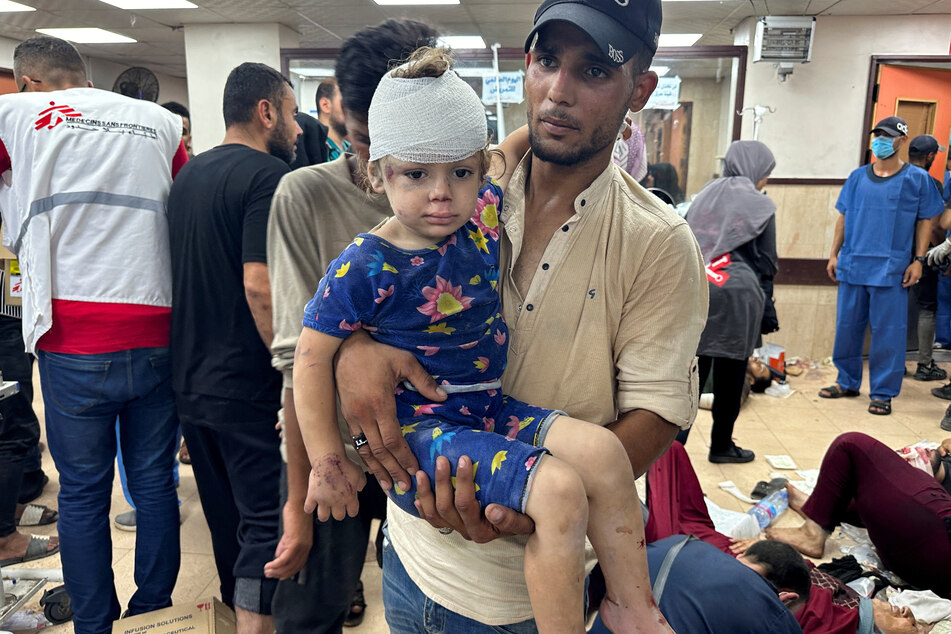 An injured child receives treatment at Al-Aqsa Martyrs Hospital, in the aftermath of an Israeli strike, in Deir Al-Balah in the central Gaza Strip.