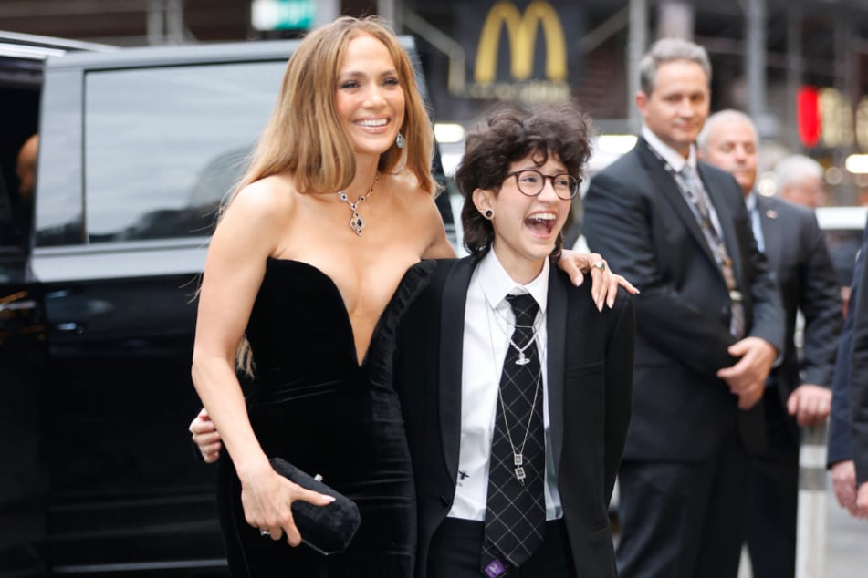 Jennifer Lopez (l.) and her child, Emme, were spotted leaving an LA dance studio, fueling collaboration rumors.