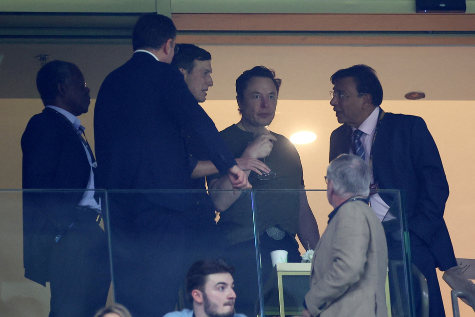 Elon Musk (top, 2nd from r.) attended the 2022 World Cup final in Qatar on Sunday.