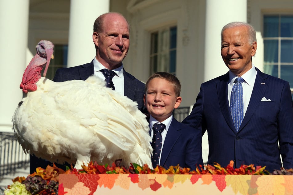 President Joe Biden (r.) took part in his final Thanksgiving turkey pardoning ceremony on Monday, where he spared birds Peach and Blossom.