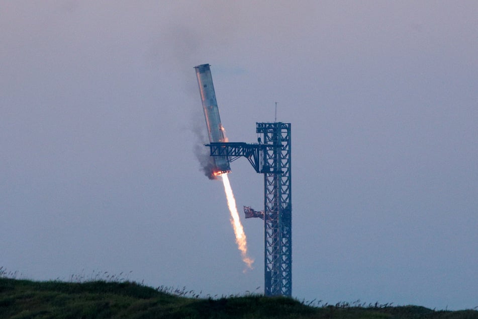 SpaceX's system for "catching" rocket boosters successfully passed a test for the first time on Sunday.