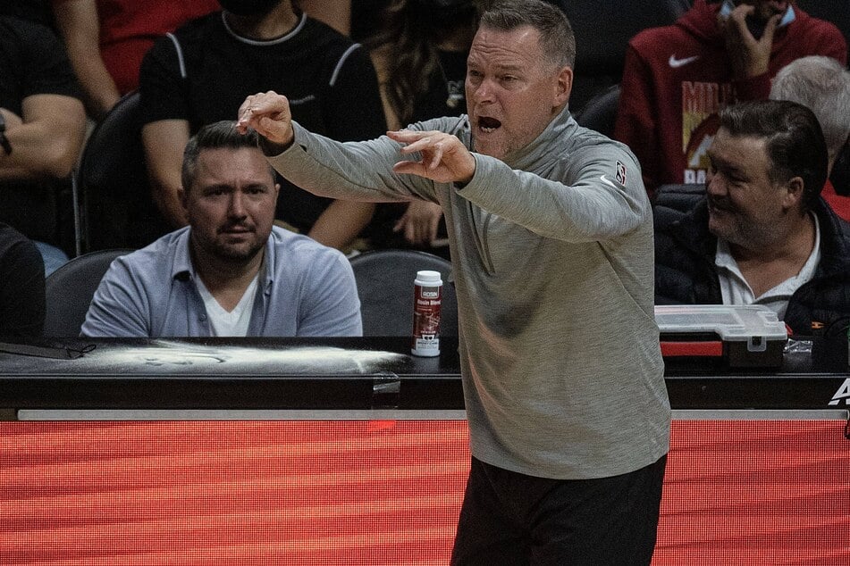 Denver Nuggets head coach Michael Malone giving out instructions.