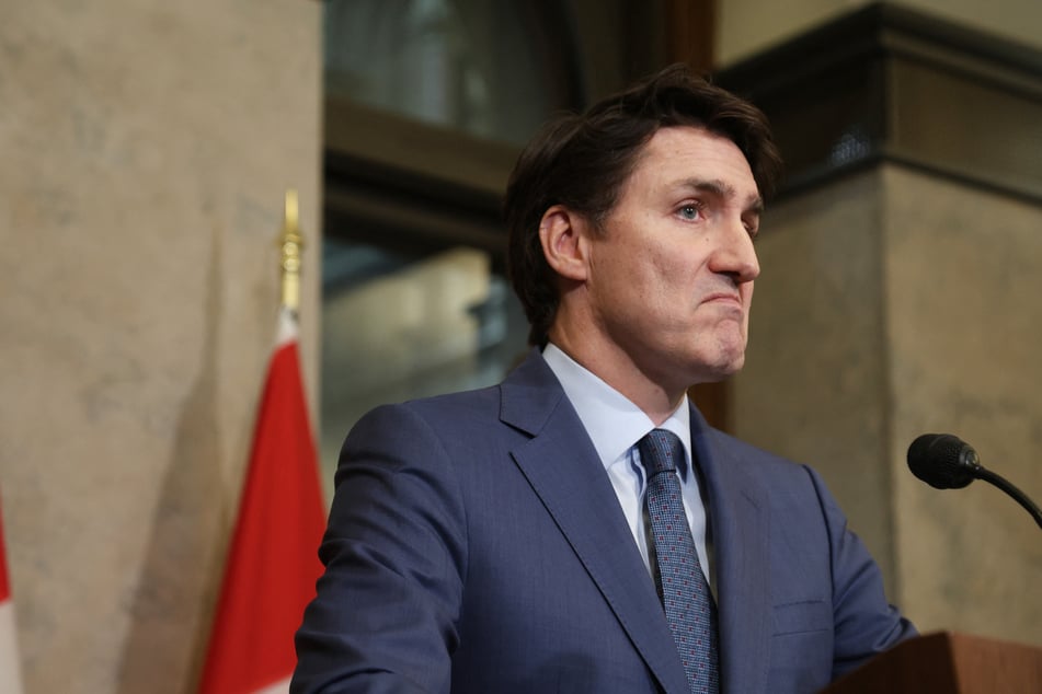 Prime Minister Justin Trudeau (pictured) on Tuesday angrily denounced Donald Trump's "dumb" tariffs.