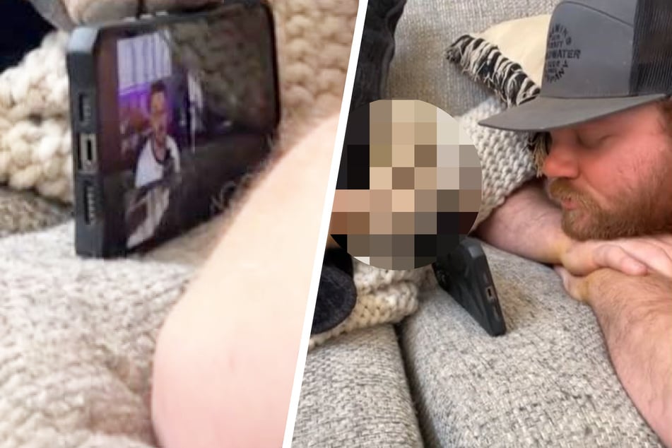 Mann schaut Video auf seinem Handy: Wer es für ihn hält, lässt Lachtränen fließen
