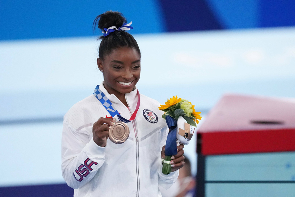 Simone Biles earned the bronze medal in the balance beam final on Tuesday.