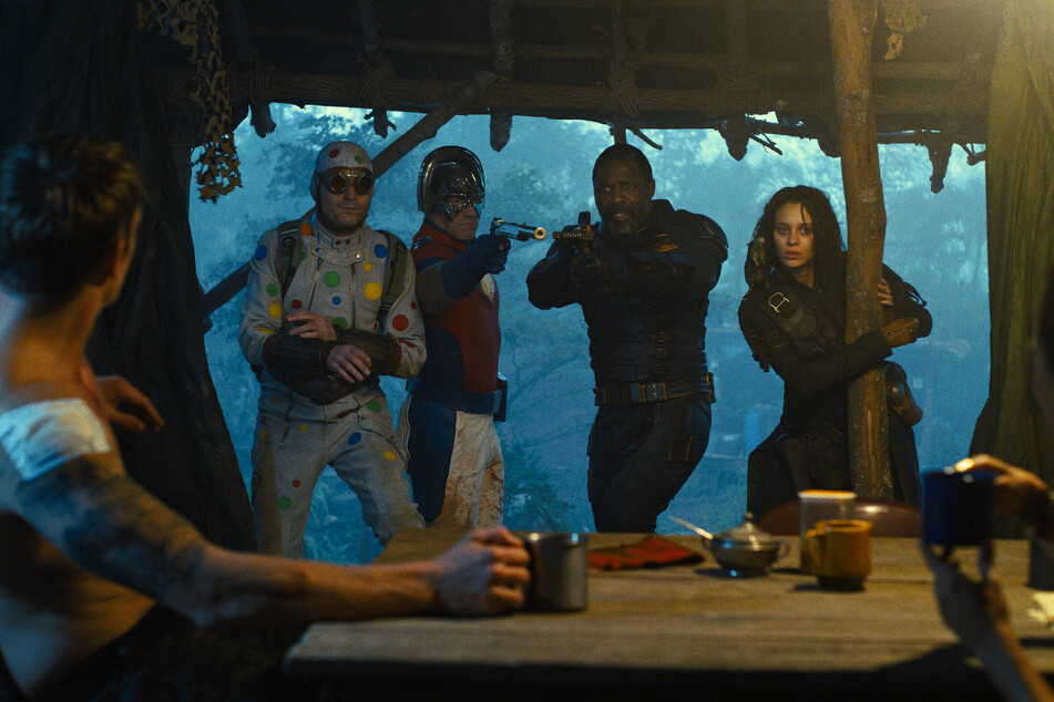 Joel Kinnaman, David Dastmalchian, John Cena, Idris Elba, and Daniela Melchior (from l-r) star in The Suicide Squad.