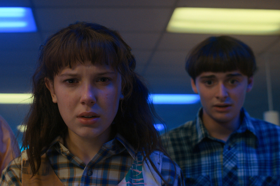 Millie Bobby Brown and Noah Schnapp co-star as Eleven and Will, respectively, on Netflix's Stranger Things.