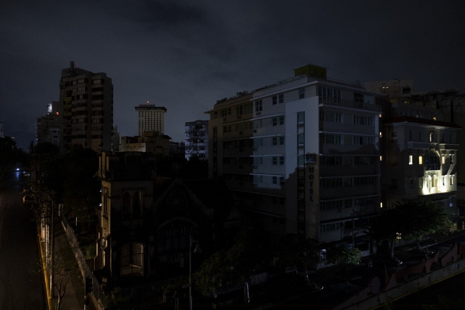 Residential buildings are seen in the dark in San Juan, Puerto Rico after a major power outage.