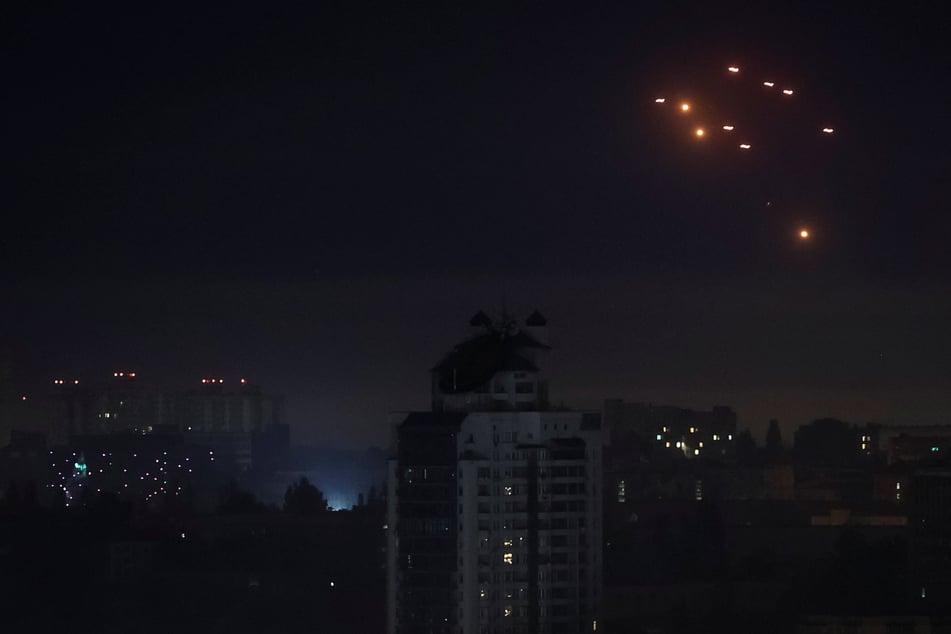 Ukrainian cities were hit by a record number of Russian drones in an attack that killed at least 13 people.