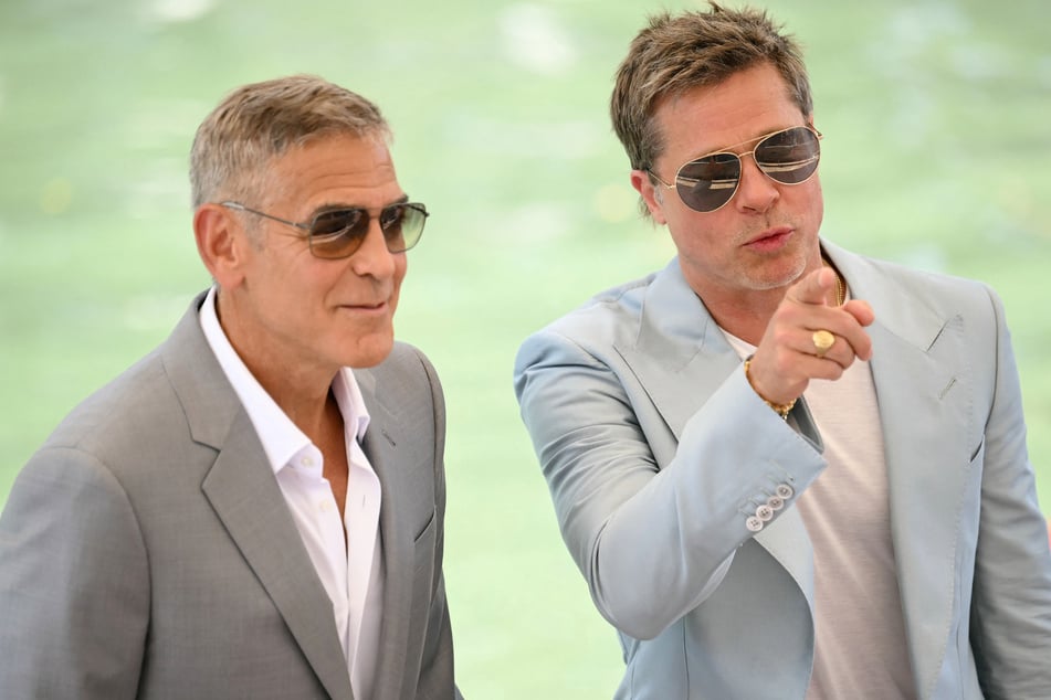 Brad Pitt and George Clooney reignite bromance at Venice Film Festival