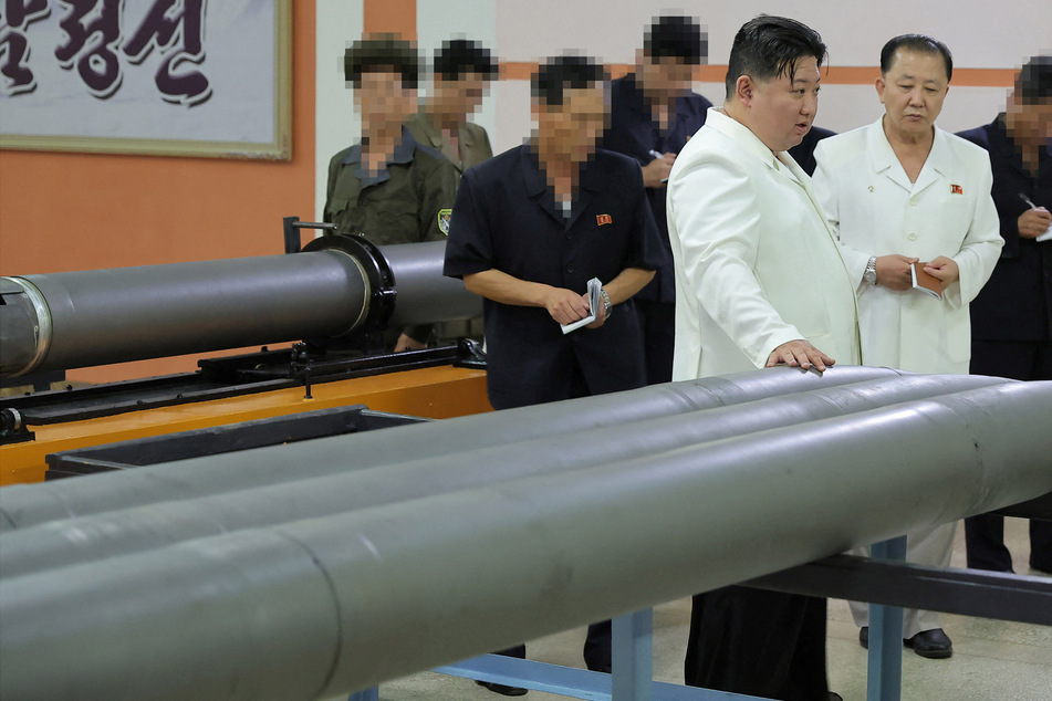 North Korean leader Kim Jong-un toured weapons factories and demanded an increase in missile production.