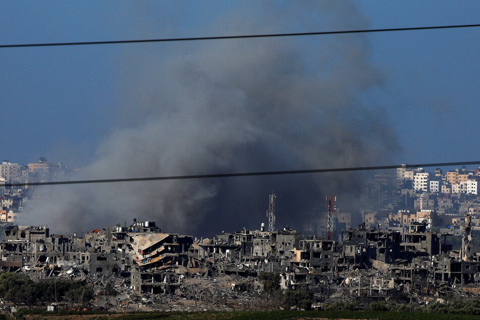 Smoke rises over Gaza as Israeli airstrikes continue on October 30, 2023.