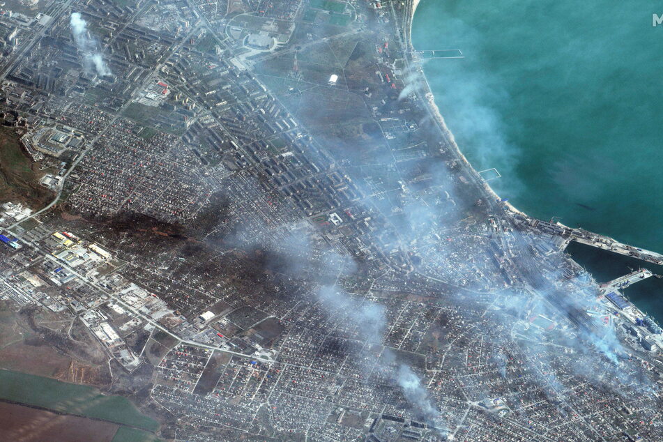A satellite image shows buildings on fire in Mariupol, Ukraine. (Satellite image 2022 Maxar Technologies/Handout via REUTERS)
