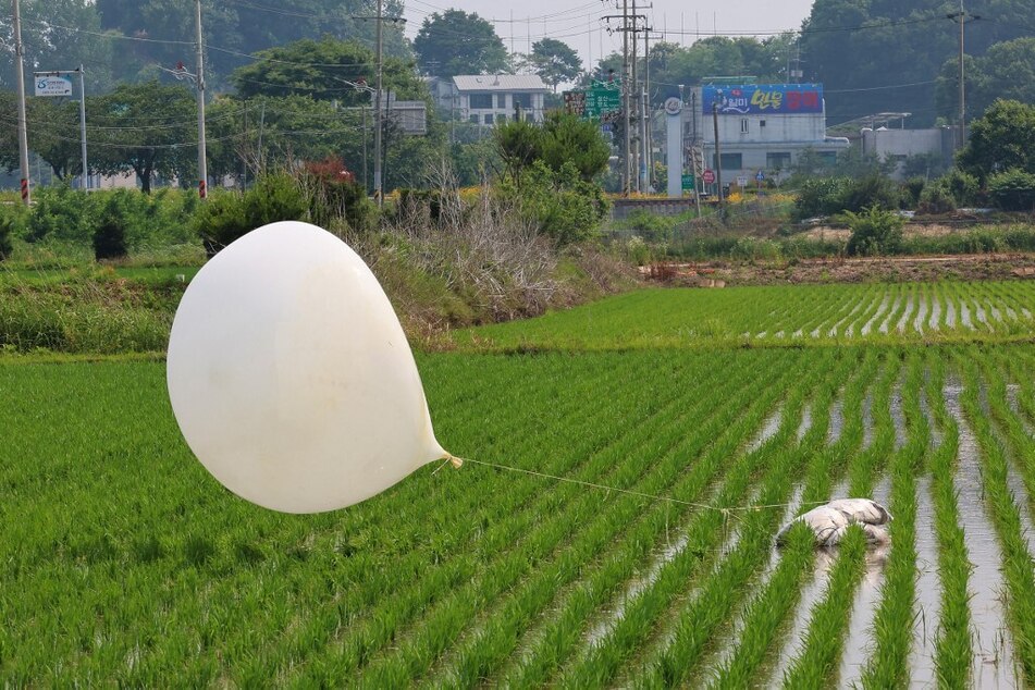 A balloon carrying trash, believed to have been sent by North Korea, lands in Incheon, South Korea.