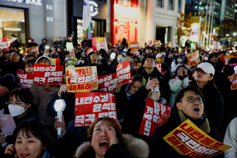 South Korean President Yoon Suk Yeol narrowly survived an impeachment effort despite mass protests.