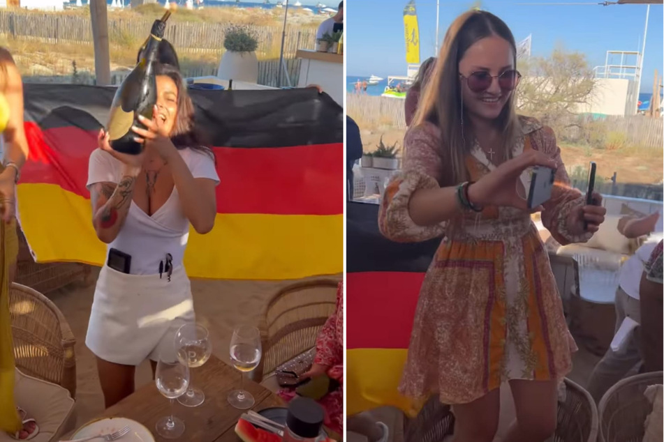 Eine Kellnerin präsentiert den Champagner zu den Klängen der deutschen Nationalhymne.