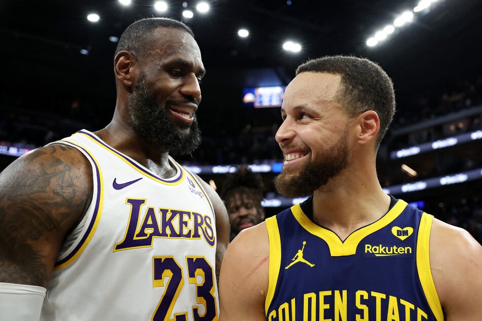 NBA superstars LeBron James (l.) and Stephen Curry are "excited" to join forces as the US chases a fifth straight gold medal at next month's Olympics.